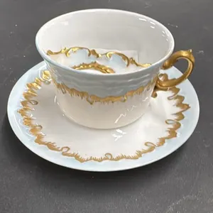 Limoges France Porcelain Cup and Saucer Set with G