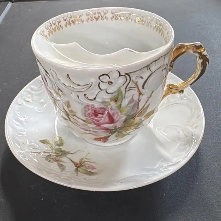 Antique Porcelain Mustache Cup and Saucer Set with