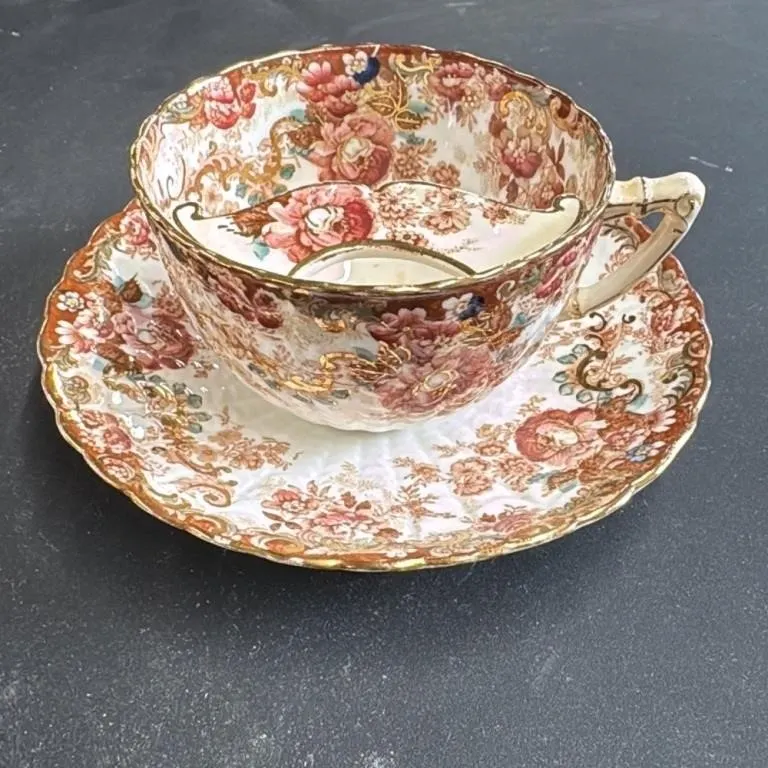 Antique Floral Teacup and Saucer Set
