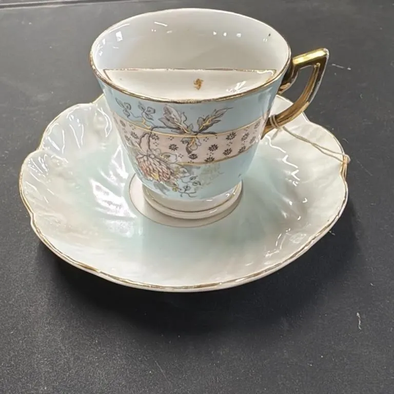 Antique German Porcelain Mustache Cup and Saucer S
