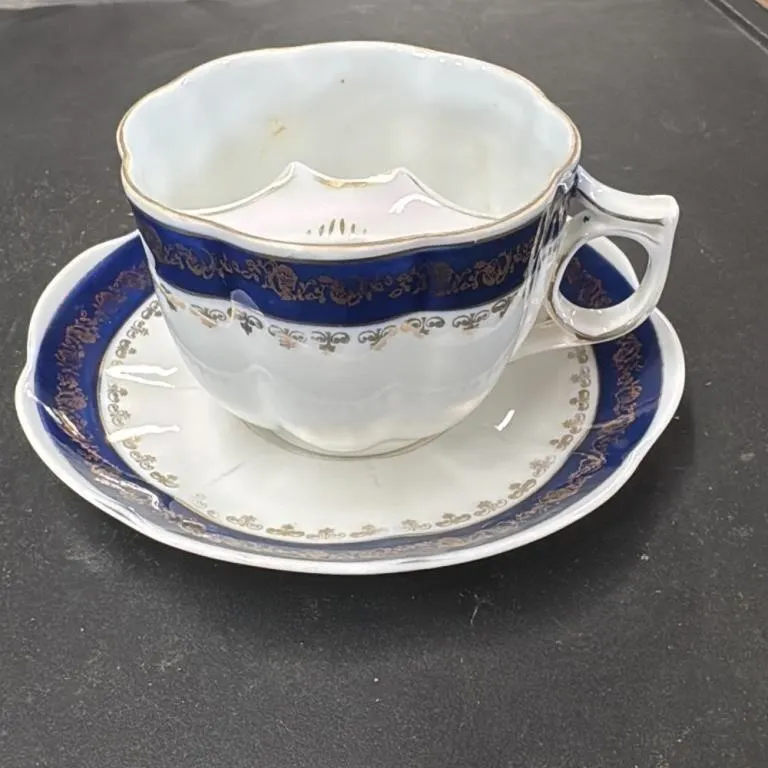 Antique Porcelain Mustache Cup and Saucer Set Blue