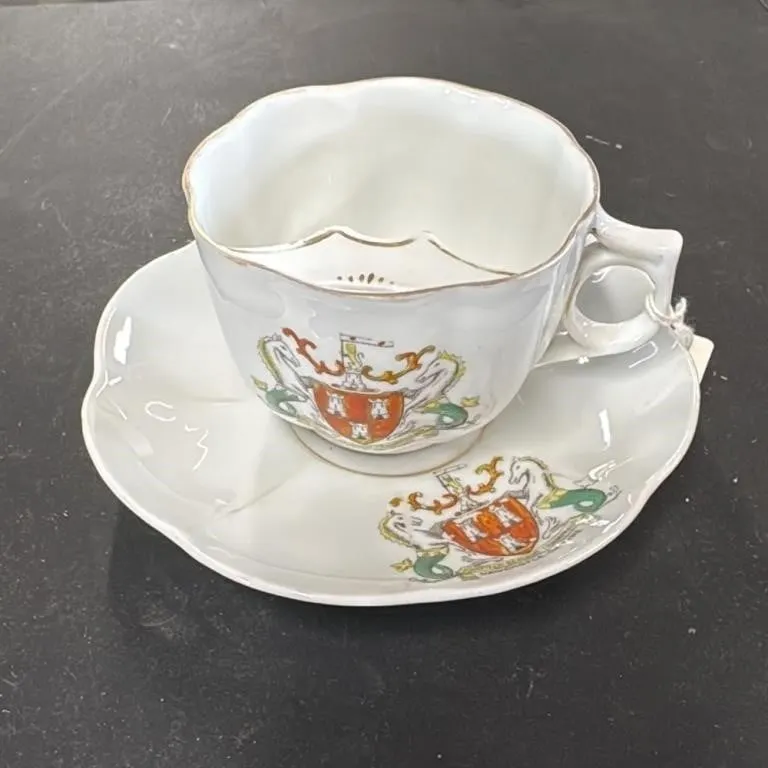 Vintage Porcelain Cup and Saucer with Crest