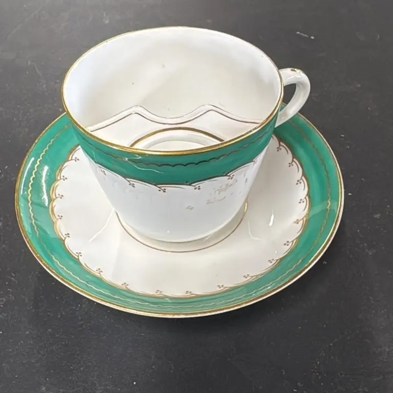 Antique Porcelain Mustache Cup and Saucer Set Gree