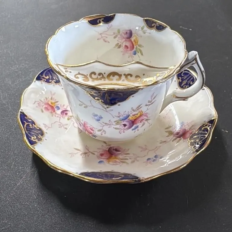 Vintage Floral Teacup and Saucer Set with Blue Tri