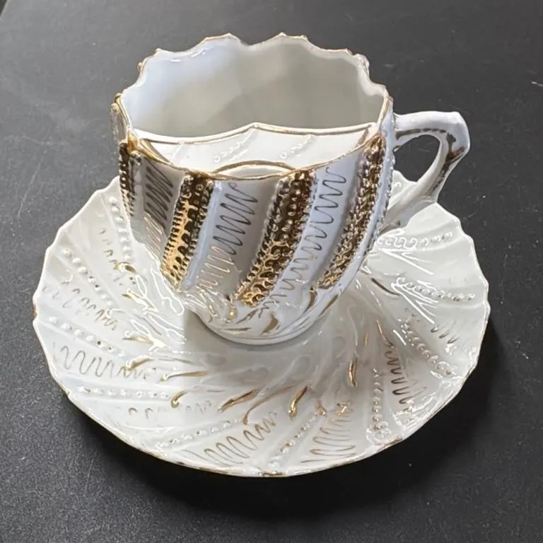 Vintage White Porcelain Teacup and Saucer Set with