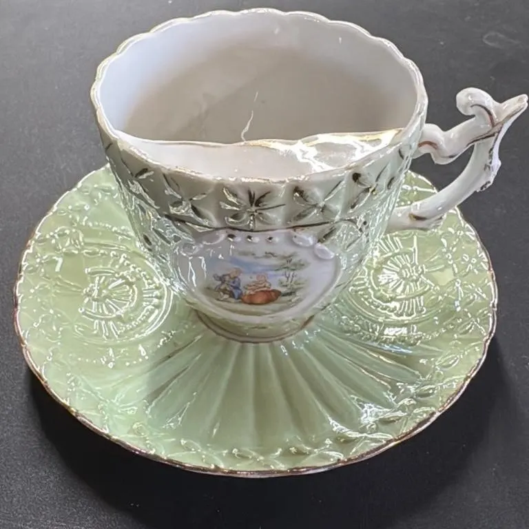 Vintage Green Porcelain Teacup and Saucer Set with