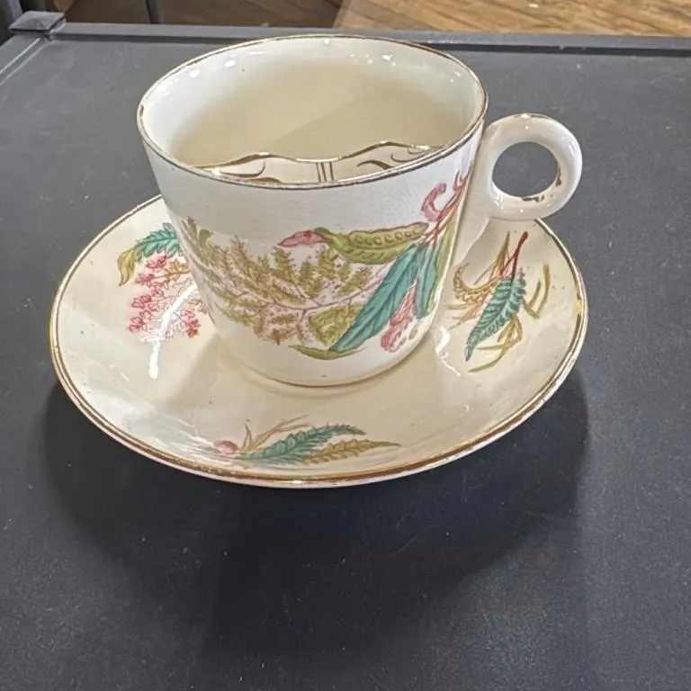 Antique Porcelain Moustache Cup and Saucer Set Flo