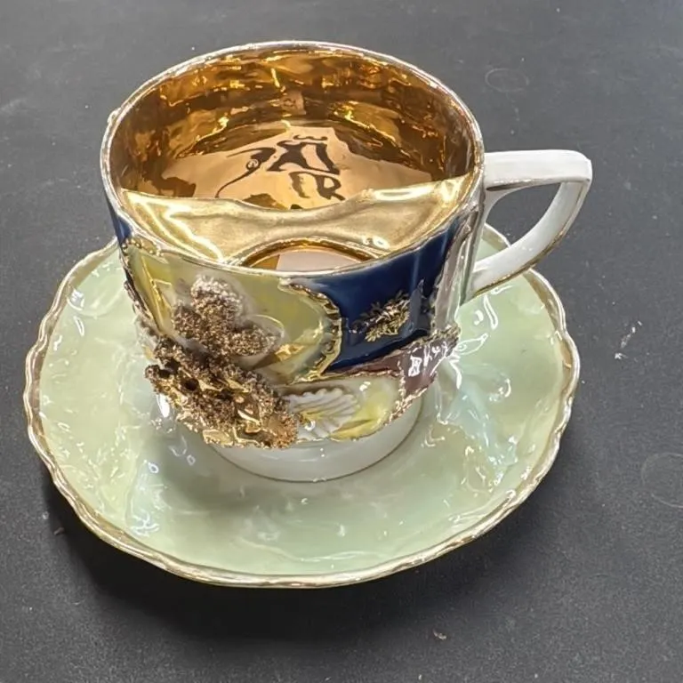 Vintage Gilded Porcelain Teacup and Saucer Set