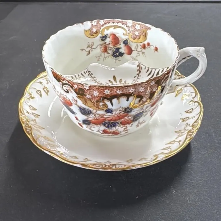 Antique Porcelain Tea Cup and Saucer Set with Gilt
