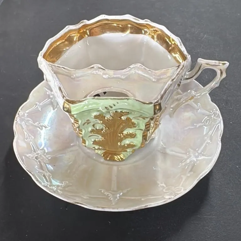 Vintage Iridescent Cup and Saucer Set with Gold Tr