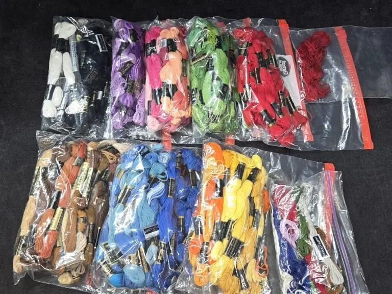 Black Tin full of Embroidery Floss of all Colors