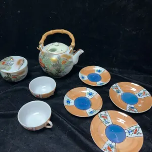 Japanese Hand-Painted Porcelain Tea Set With Bamboo Handle, Landscape And Floral Motifs, Early 20th