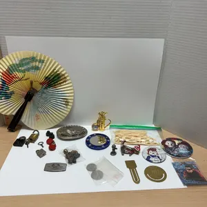 Eclectic Collectibles Lot With Law Enforcement Buckle, Columbus Dispatch Knife, Tokens, Pins, And Cu