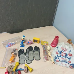 Mid-Century Toys: Wiggle TV Pencil Sharpener, Table Champ Marble Bag, Donald Duck, and More