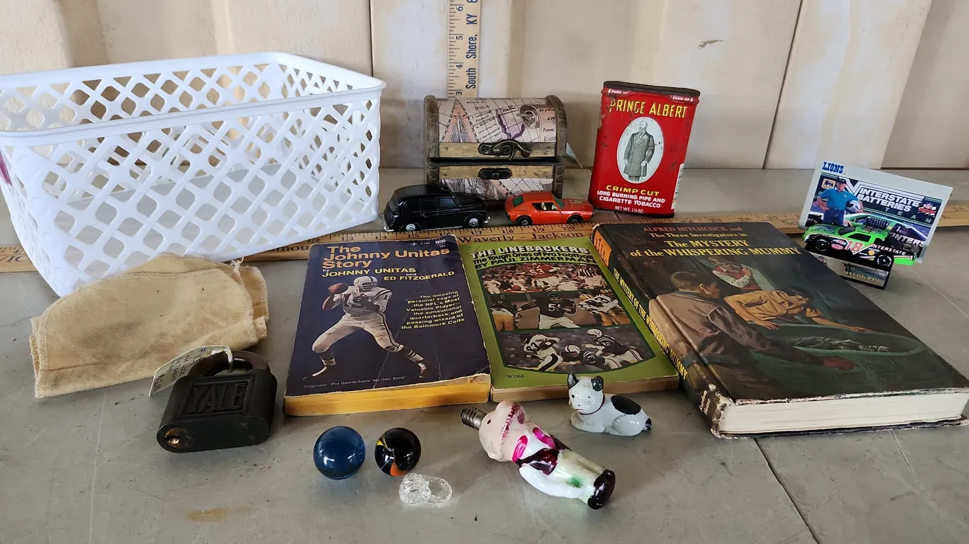 Prince Albert Tobacco Tin, Small Treasure Chest, Alfred Hitchcock Book, 2 Shooter Marbles, Etc.