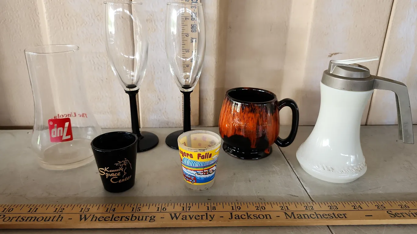 7 Up Glass, Canada Pottery Mug, Syrup Bottle, 2 Tourist Shot Glasses, & 2 Black Amethyst Stemware Gl