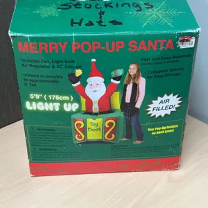 Merry Pop-Up Santa Light-Up Inflatable Holiday Decoration With Toy Chest