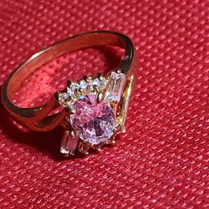14K Gold Ring (Unverified) With Round Center Stone and Baguette-Cut Accents In Cluster Setting