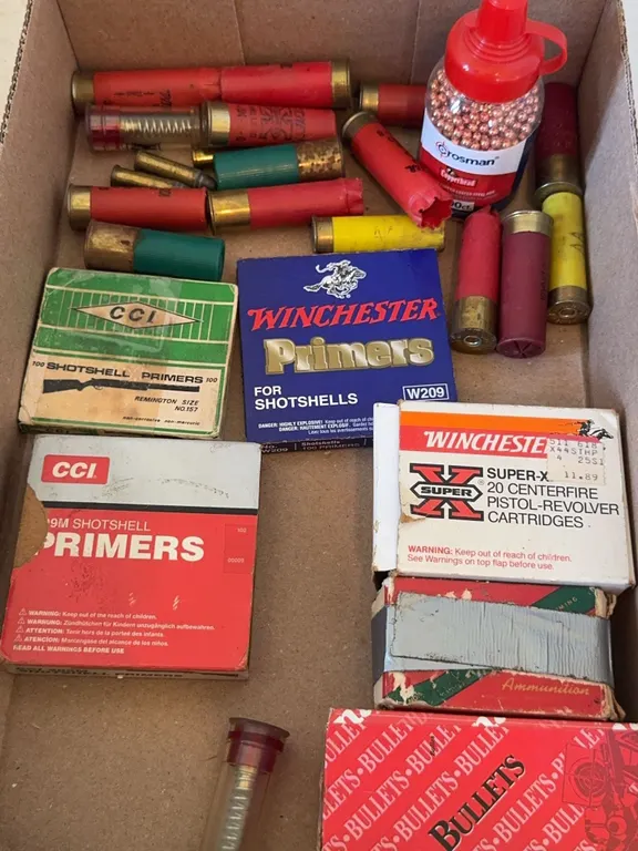 Assorted Reloading Supplies Primers Ammo Boxes and Crosman BBs Lot