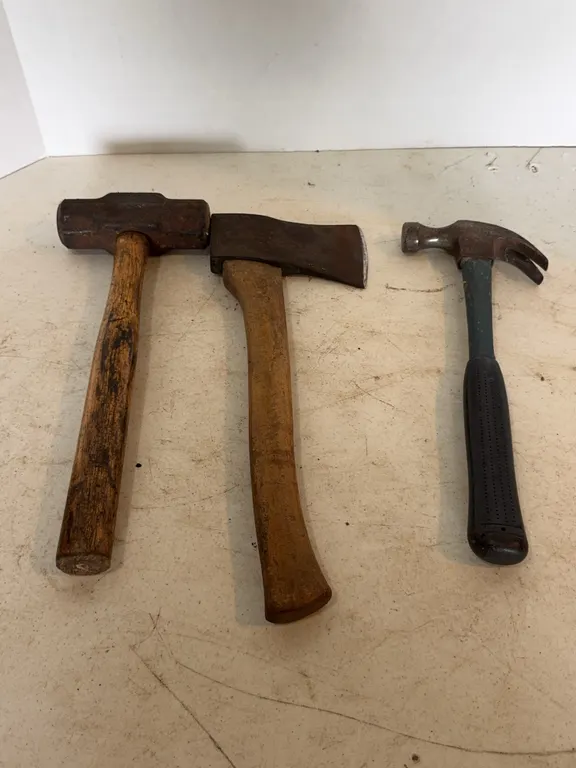 Assorted Hand Tools Including Sledgehammer Hatchet and Plumb Claw Hammer