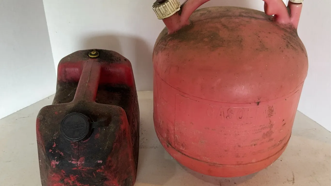 Pair of Plastic Gasoline Cans Including Blitz Two Gallon Can