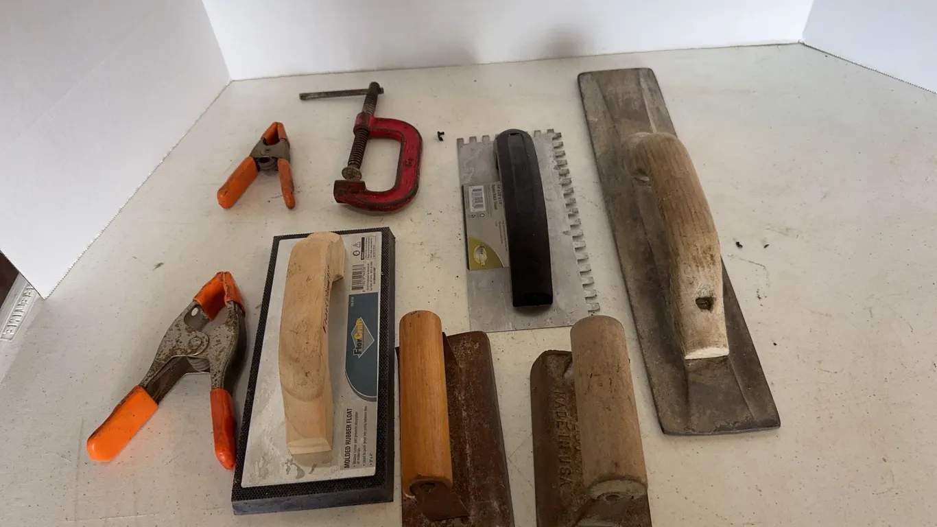 Assorted Masonry Trowels Concrete Floats and Clamps