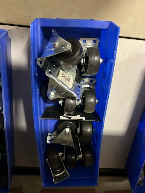 NEW/UNUSED TRAY OF 2 1/2" FIXED CASTORS