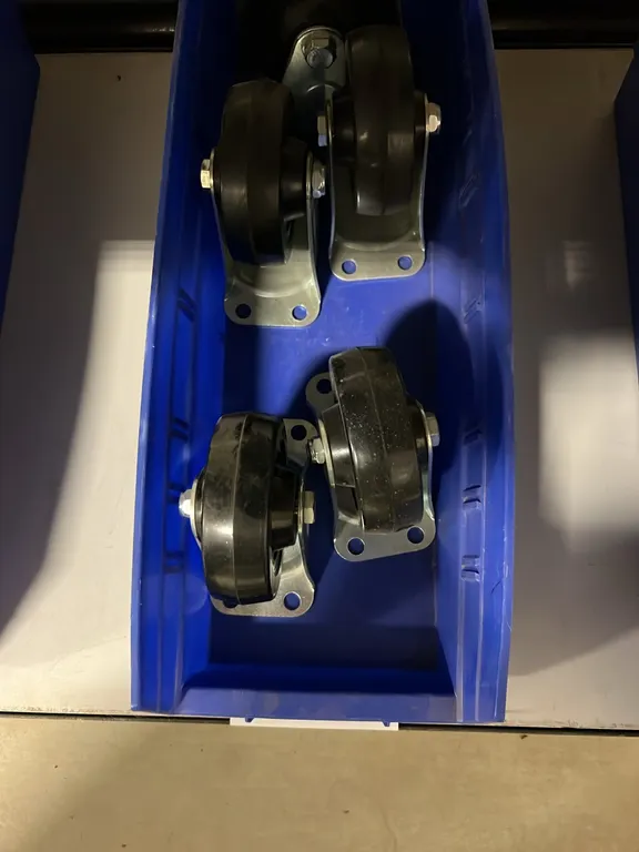 NEW/UNUSED TRAY OF 4 - 4" FIXED CASTORS