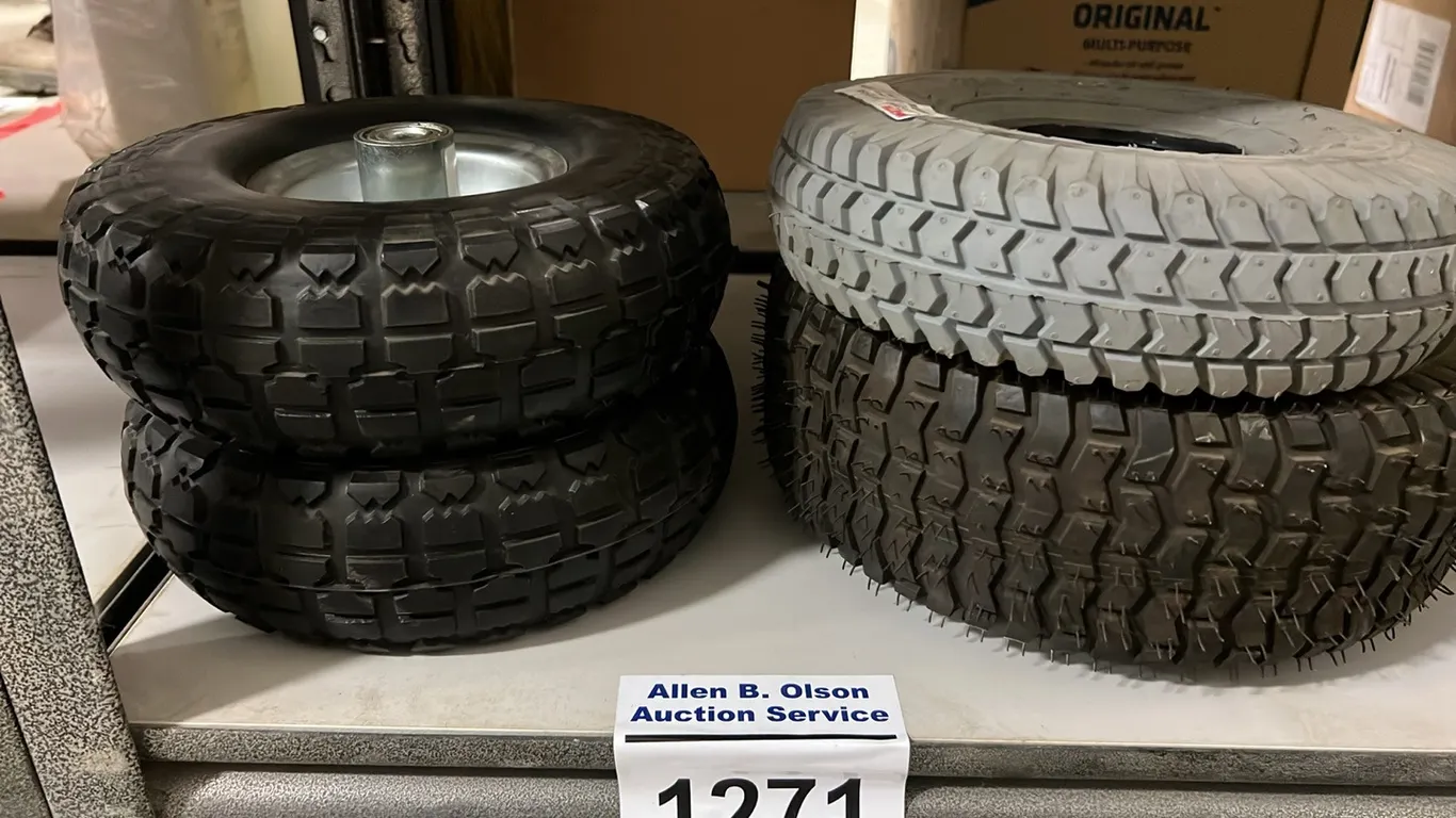 NEW/UNUSED TIRES ON HUBS