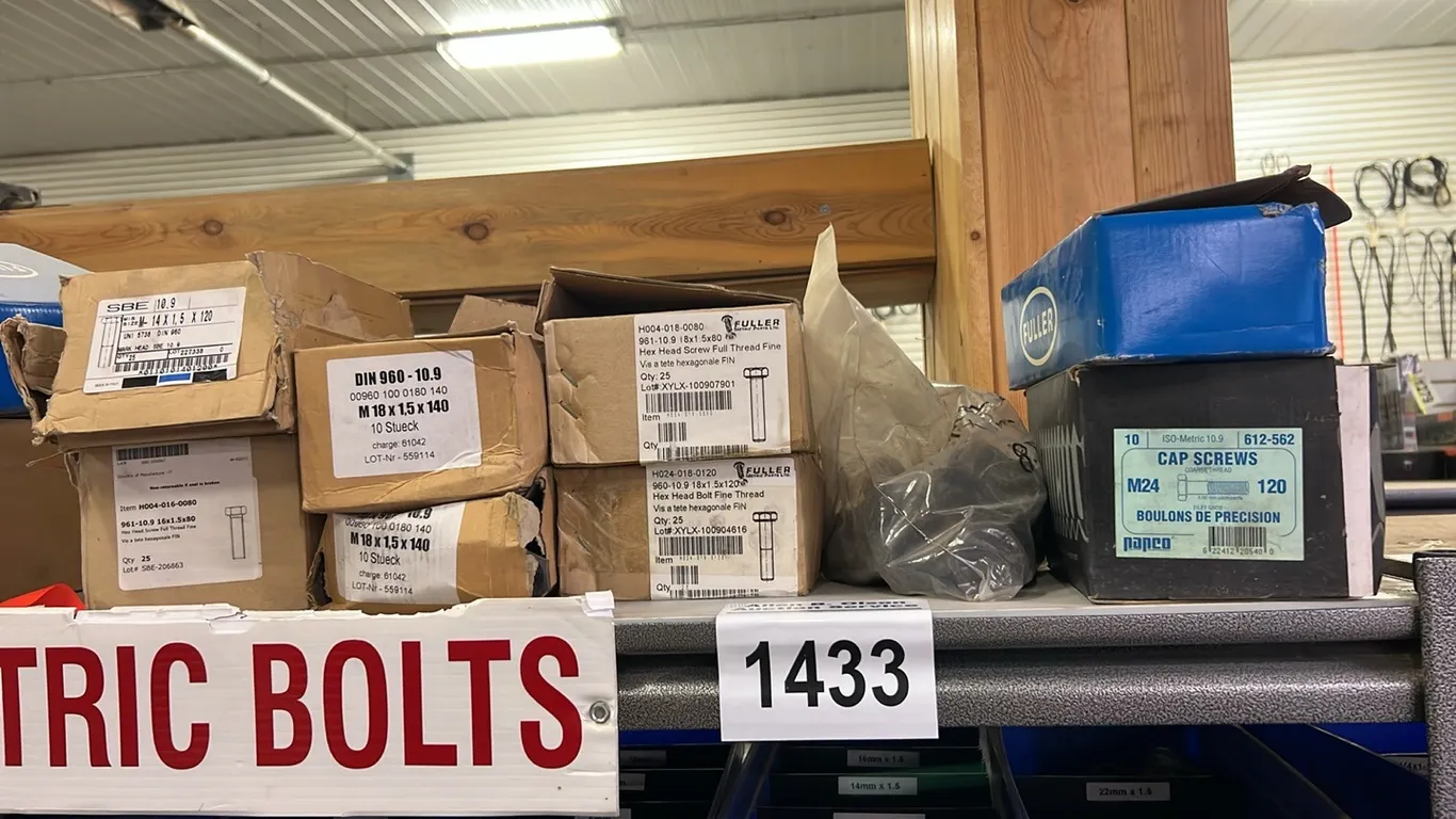NEW/UNUSED CONTENTS ON TOP SHELF SEPARATED BY RIBBON