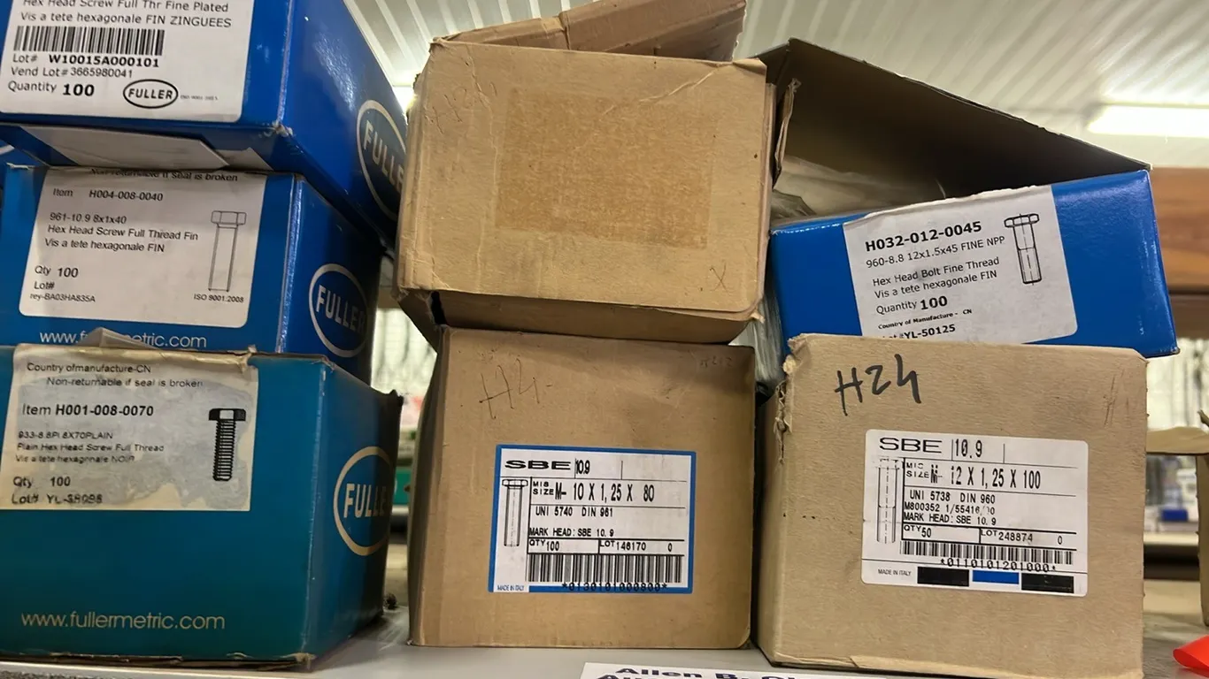 NEW/UNUSED CONTENTS ON TOP SHELF SEPARATED BY RIBBON
