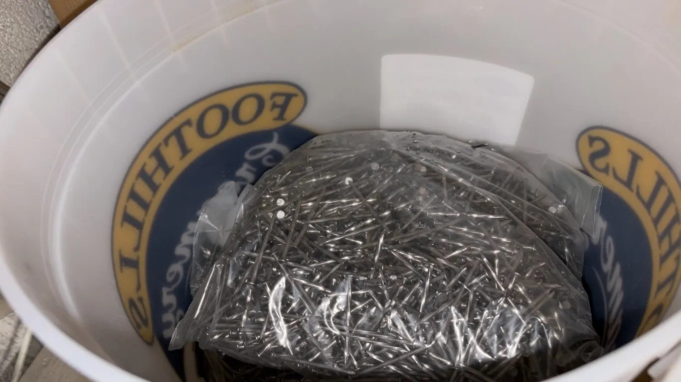 NEW/UNUSED ONE PAIL CONSISTING OF 4 BAGS OF 1 1/2" STRAIGHT NAILS & ONE PAIL CONSISTING OF 4 BAGS OF 1 1/2" ARDOX NAILS