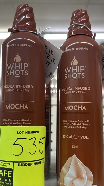 Whipshots vodka-infused whipped cream. Assortment includes (7) Mocha, (1) Caramel, and (5) Vanilla. 200ml per can. 10% Alc./Vol. Liquor can only be pi