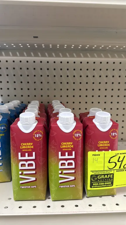 Vibe Twisted Sips Cherry Limeade alcoholic beverage cartons. 500 mL Tetra Pak carton packaging with screw caps. Features 12% alcohol by volume grape w