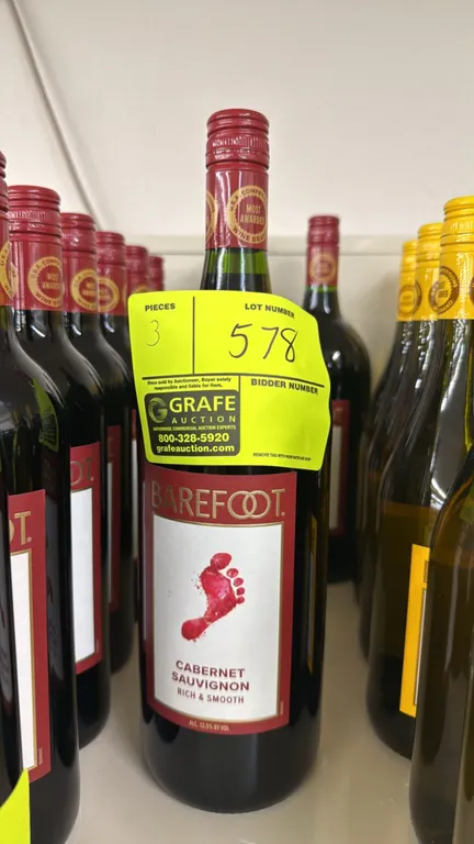 Barefoot Cabernet Sauvignon red wine bottles. Features 1.5L volume per bottle with 13.5% alcohol by volume. California vinted and bottled. Liquor can
