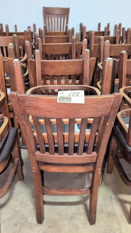 Faux leather cushioned wood dining chairs (including stock photos)