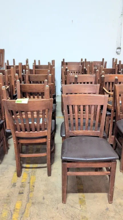 Faux leather cushioned wood dining chairs (including stock photos)