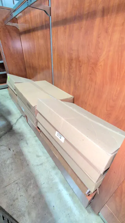Boxes of 28"x18" white newsprint paper