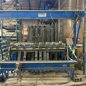 James L. Taylor 800128 pneumatic wood gluing clamp carrier rack. Features revolving clamp sections and pneumatic clamp tightener carriage. Includes ho