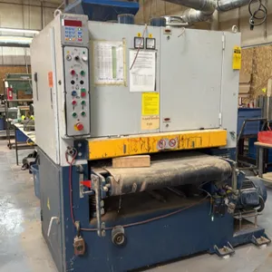 2004 Cantek PR-900NA 36" 2-head wide belt sander. Features digital position controller, dual drive motors, conveyor feed bed, and dust collection hood