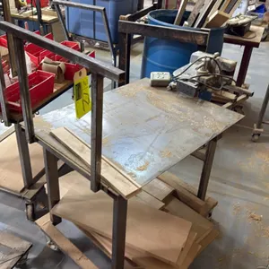 MHC 805-1010 1-ton arbor press with portable metal stands. Features a 1-ton manual rack-and-pinion press with an attached heated stamping/branding pla