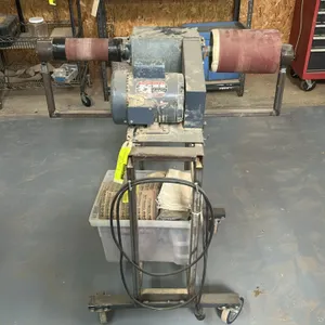 Sand-Rite pneumatic drum sander setup. Features dual pneumatic sanding drums, belt-driven Dayton electric motor, and integrated support arms. Includes