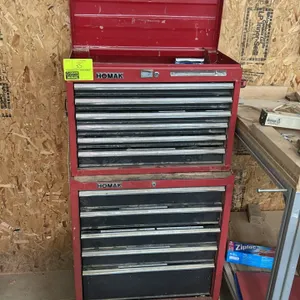 Homak 2-piece rolling tool chest combo. Features multi-drawer top chest with lift lid and bottom multi-drawer rolling cabinet. Mounted on casters. Inc