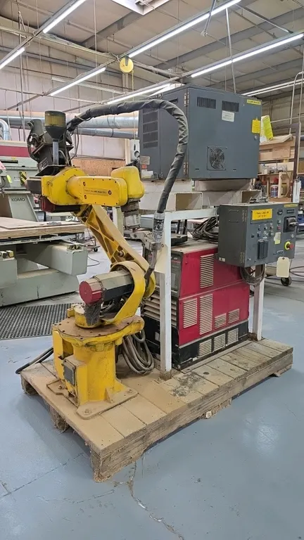 Lincoln Electric Power Wave 450 robotic welding power source package. Includes Fanuc Arc Mate 100 robotic arm, Fanuc System R-J2 controller, teach pen