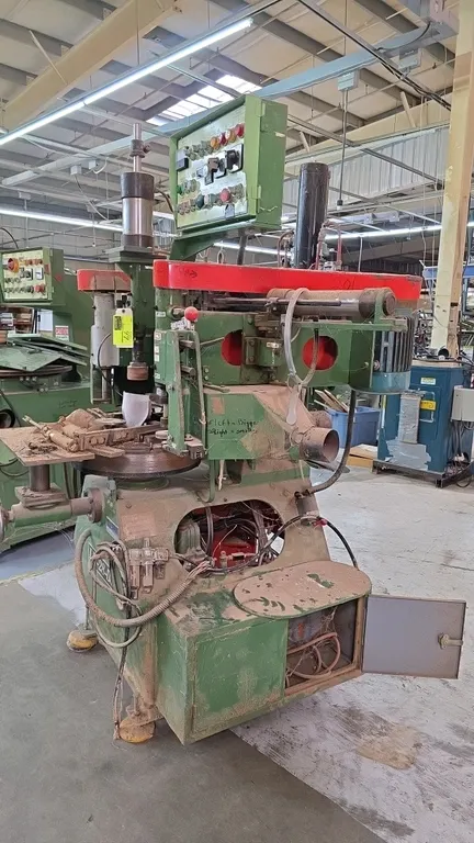 1996 Champ Fond LH-28DS automatic copy shaping machine. Features overhead pneumatic hold-down cylinder, dual cutter heads, rotary work table, top-moun