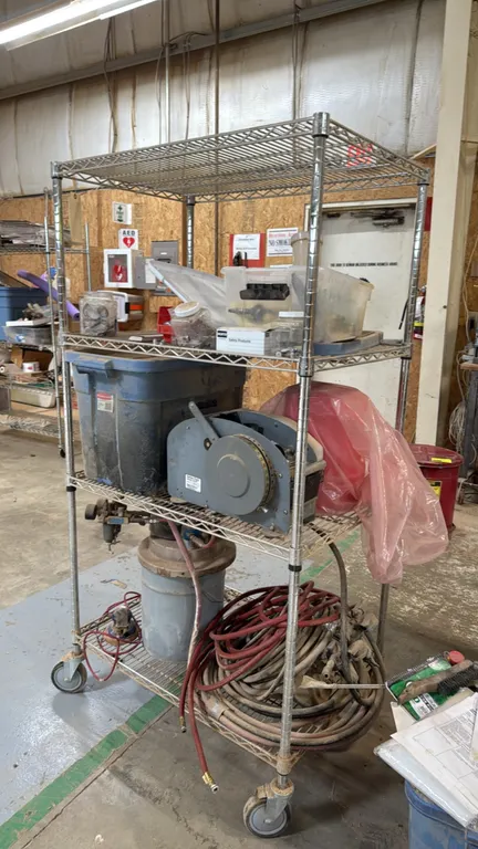 Metro-style 3-tier chrome wire mobile cart package. Includes Better Pack manual tape dispenser, Binks and HVLP paint spray guns, pneumatic paint press