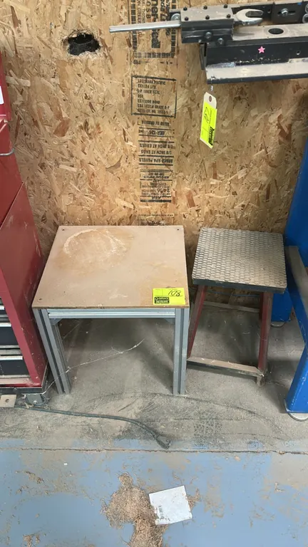 Metal shop stools. Includes (1) extruded aluminum frame stand with wood top and (1) metal frame stool with textured rubber tread top.