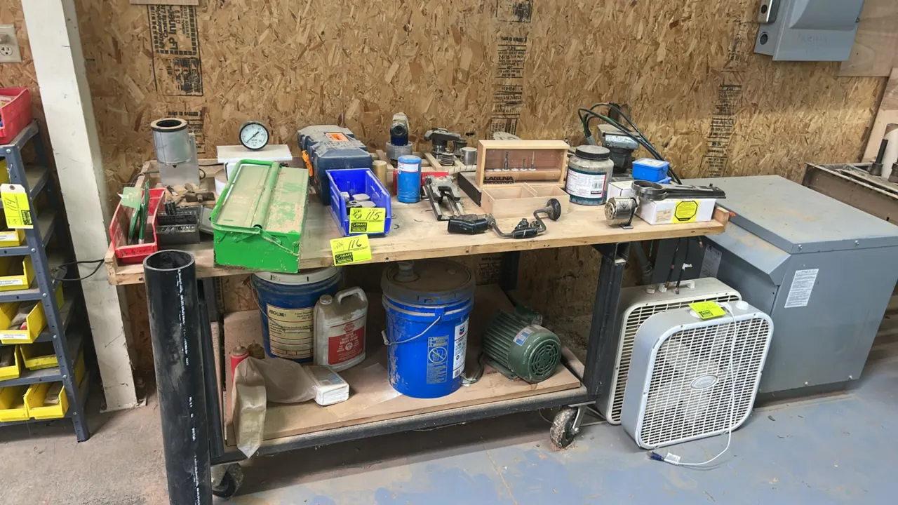 Assorted shop tooling and equipment lot. Includes Central Machinery electric motor, drill bits, shaper/router cutter heads, ER collets, toolboxes, han
