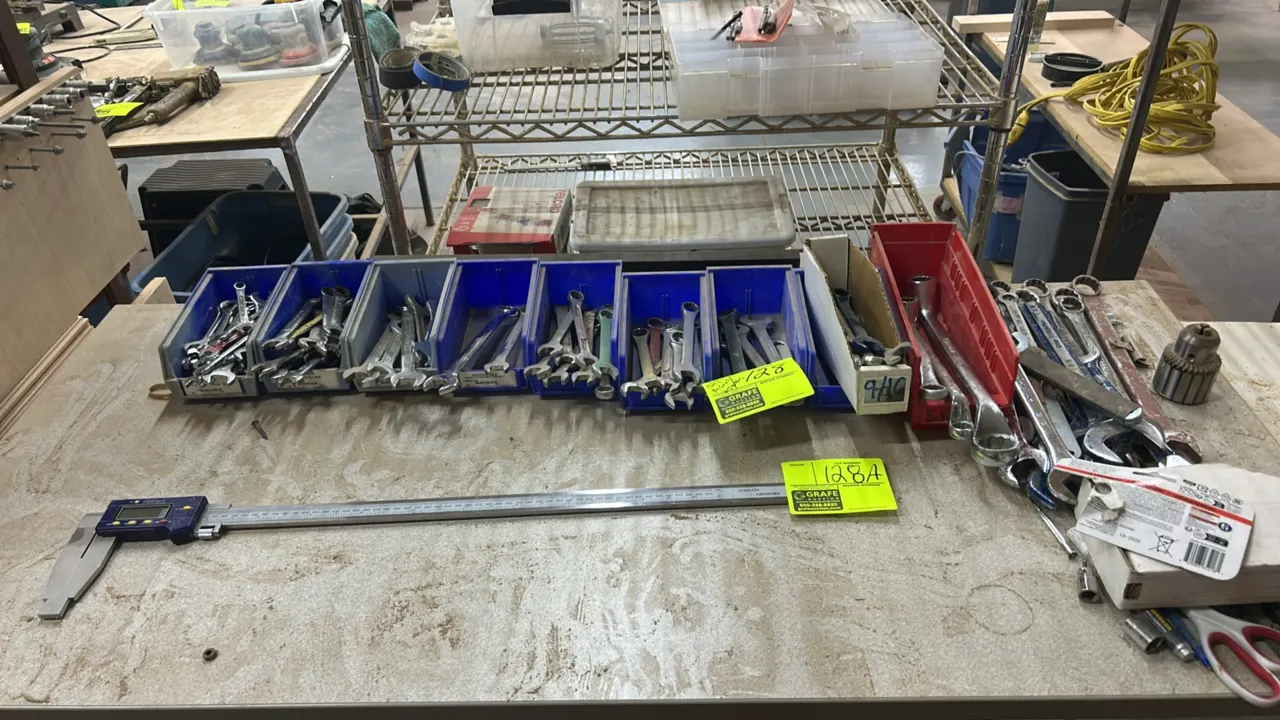 Assortment of wrenches. Features various styles including combination, open-end, and offset box wrenches in assorted metric and SAE sizes. Includes br
