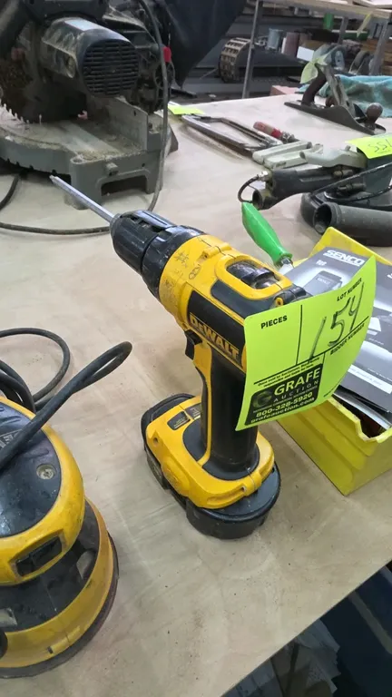 DeWalt DCD760 1/2" cordless drill driver. Features keyless chuck, 2-speed variable transmission (0-500 / 0-1,700 RPM), and attached 18V battery. S/N: